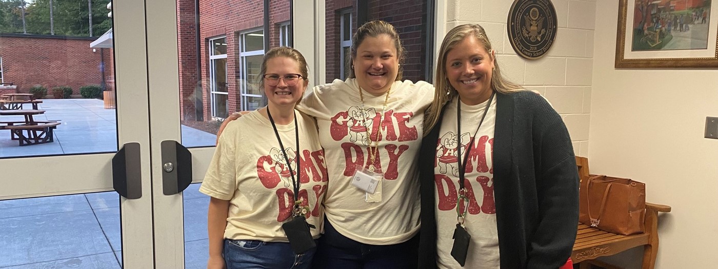 3 female teachers wearing University of Alabama shirts