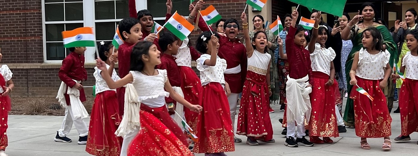 students waiving flags